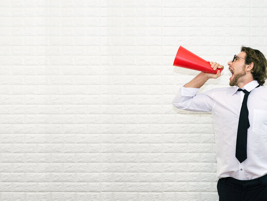 Businessman Shouting on the Megaphone to Said Something with Copy Space for Put Your Text or Wording to Make Background , Banner , Cover , Advertise